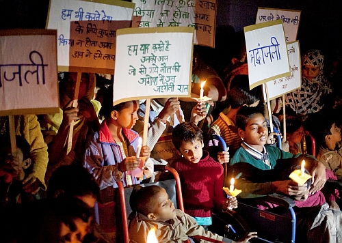 Children with congenital  disorders linked to the Bhopal gas leak at a candle-light vigil. / Credit:Chingari Trust/IPS